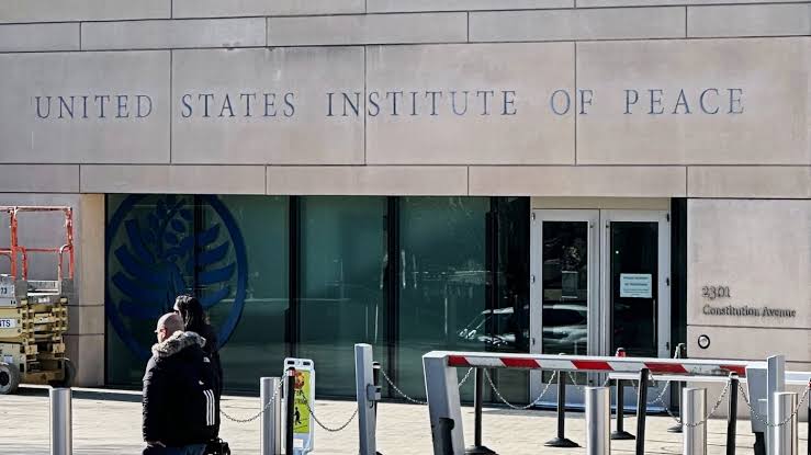 A court is asked by the US Institute of Peace and its ousted board members to prevent Trump from engraving his name on the structure.